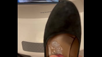 Cum in wife shoes while watching footjob video