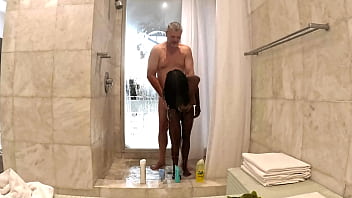 Sexy Black Milf takes a hot steamy shower with white sugar daddy at his penthouse