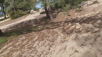 Guy of car spills a lot of milk on a trail near the sea