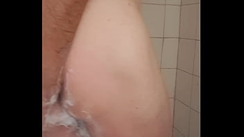 Soapy penis in shower plying