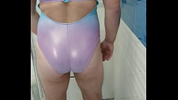 Boy in shiny swimsuit